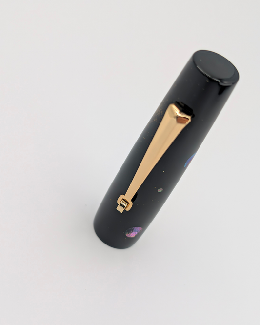 Liberum Star Shine cap with gold-tone clip and mother-of-pearl inlays on black lacquer